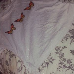 White shirt with 3 butterflies 🦋. PRICE: 5$.